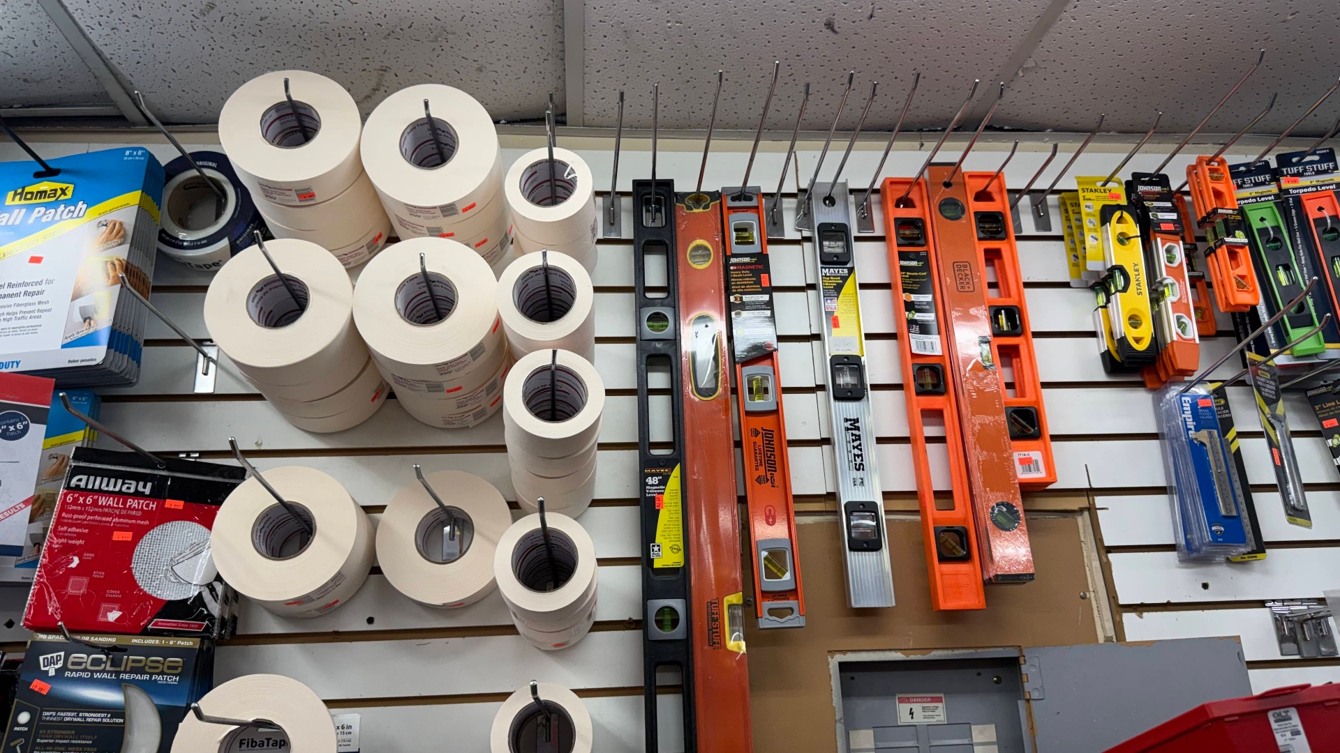 Drywall joint tape, wall patches, and levels